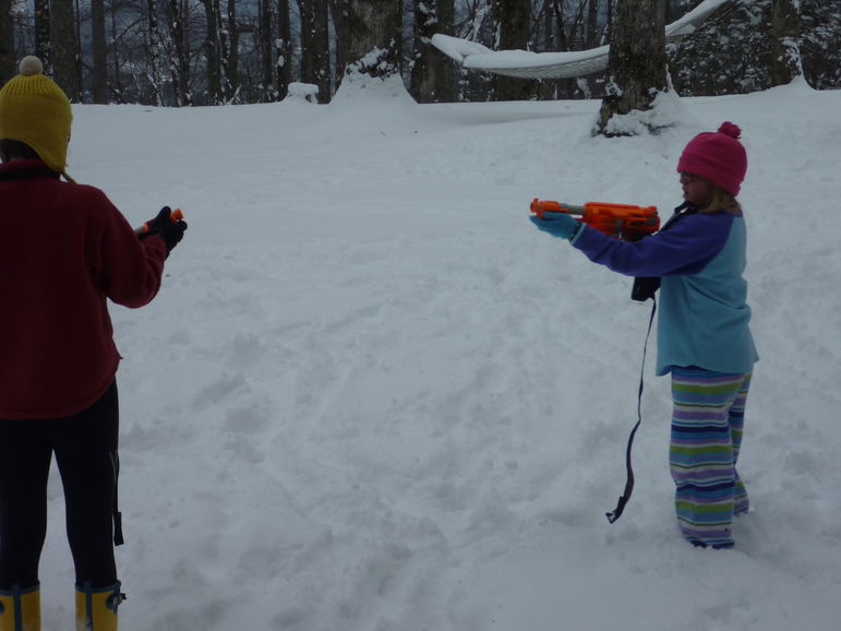Mary and Annie in a Nerf Dart war at Falling Creek Camp