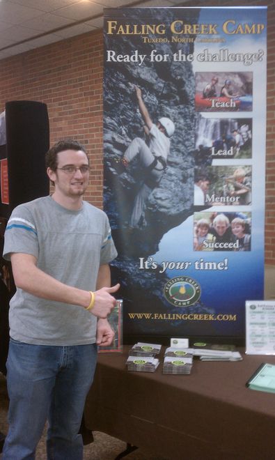 Adam Screech Lewis helping man the table at the Berea College job fair.