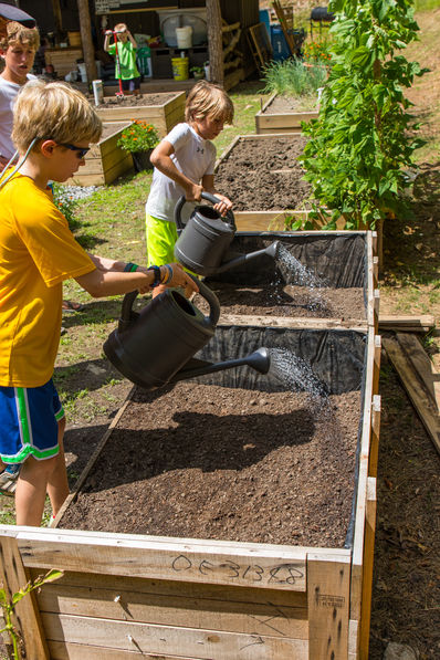 Campers at Falling Creek Camp learning to farm in raised beds.