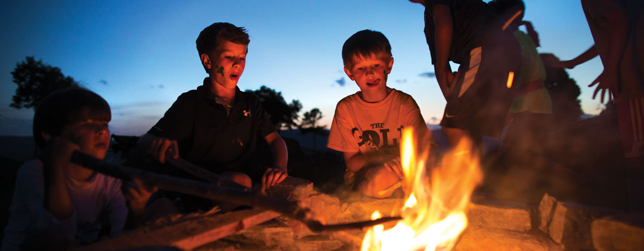 Boys-eating-smores-at-campfire