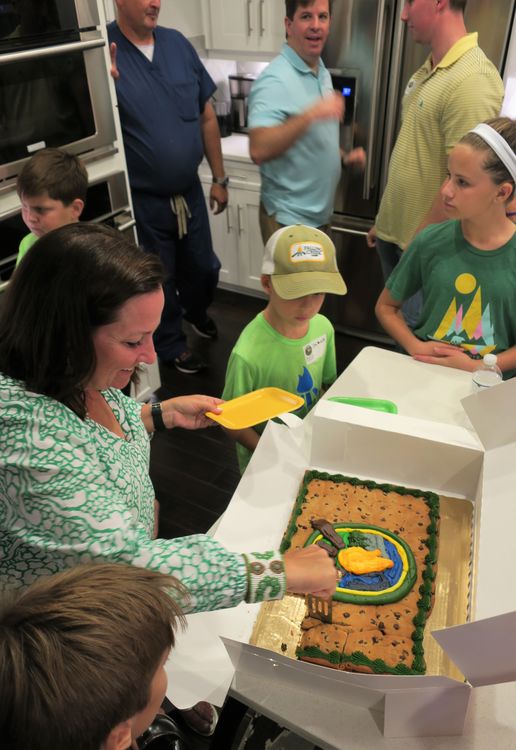 Laura Lawton serves a very special Falling Creek Cookie Cake to the families when she hosted the camp movies and reunion in Winter Park, FL in October 2018